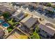 Aerial view of single-Gathering home with pool and solar panels at 6030 W Kimberly Way, Glendale, AZ 85308