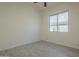 Spacious bedroom with large window and light wood-look floors at 6030 W Kimberly Way, Glendale, AZ 85308