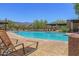 Inviting community pool with plenty of lounge chairs at 6814 E San Cristobal Way, Gold Canyon, AZ 85118