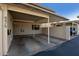 Covered carport with EV charger and additional parking at 8475 E Chaparral Rd, Scottsdale, AZ 85250