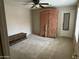 Guest bedroom with large wardrobe and ceiling fan at 8846 E Copper Dr, Sun Lakes, AZ 85248