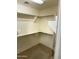 Walk-in closet with ample shelving and hanging space at 8846 E Copper Dr, Sun Lakes, AZ 85248