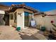 Small patio with seating area, showing a portion of the house at 11011 N 92Nd St # 1065, Scottsdale, AZ 85260