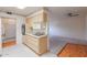 Kitchen features light wood cabinets and an electric stovetop at 12601 N Augusta Dr, Sun City, AZ 85351