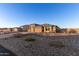 Two-story house with three-car garage and desert landscaping at 13524 W Sierra Vista Dr, Glendale, AZ 85307