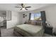 Large bedroom with king bed, ceiling fan, and ample closet space at 1407 N 44Th St, Phoenix, AZ 85008