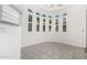 Bright breakfast nook with tile floors and multiple windows at 17937 W Weatherby Dr, Surprise, AZ 85374