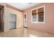 Office with closet, door to outside, and light peach walls at 17937 W Weatherby Dr, Surprise, AZ 85374