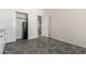 Spacious office with tile floors, a safe, and an open door to another room at 17937 W Weatherby Dr, Surprise, AZ 85374