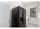 Laundry room with washer, dryer, and refrigerator at 17937 W Weatherby Dr, Surprise, AZ 85374