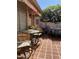 Private patio features a table and chairs, perfect for outdoor dining at 17937 W Weatherby Dr, Surprise, AZ 85374