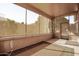 Relaxing screened porch with tiled floor at 17937 W Weatherby Dr, Surprise, AZ 85374