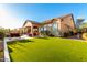 View of backyard, patio, and house exterior at 1823 N Atwood --, Mesa, AZ 85207