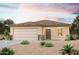 New single-story home with two-car garage and desert landscaping at 1870 Broken Arrow Dr, Wickenburg, AZ 85390