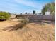 Large backyard with block wall and desert landscaping at 2525 E Michigan Ave, Phoenix, AZ 85032