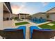 Inviting pool area with lounge chairs and a pergola for shade at 2532 N Williams St, Mesa, AZ 85203