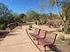 Paved walkway with benches and desert landscaping at 2605 W Florentine Rd, Phoenix, AZ 85086