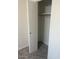 Bedroom closet with double doors and shelving at 2608 W Berridge Ln # 220, Phoenix, AZ 85017