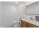 Clean bathroom with modern vanity, toilet and patterned floor at 2828 E Adams St, Phoenix, AZ 85034