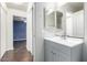 Bathroom with vanity and mirror reflecting hallway at 310 W Pontiac Dr # 3, Phoenix, AZ 85027