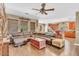 Open living room with a view of the kitchen and a large sectional sofa at 3314 W Dynamite Blvd, Phoenix, AZ 85083