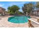 Inviting kidney-shaped pool with a fountain and spacious patio at 3314 W Dynamite Blvd, Phoenix, AZ 85083