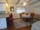 Dining area with wood table and chairs, and a view of kitchen at 3330 E Main St # 36, Mesa, AZ 85213