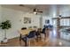 Dining area with wood table and black chairs at 3448 E Lupine Ave, Phoenix, AZ 85028