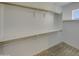 Large walk-in closet with double hanging rods at 3576 N Carlton St, Buckeye, AZ 85396