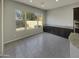 Kitchen features dark wood cabinets and granite countertops at 3576 N Carlton St, Buckeye, AZ 85396