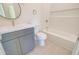 Clean bathroom with a tub, toilet, and vanity at 4145 N Golden St, Eloy, AZ 85131