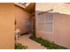 Front entry with decorative chair and window at 4713 N Brookview Ter, Litchfield Park, AZ 85340