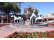 Ornate fountain with bronze horse sculptures and flowers at 5170 N 83Rd St, Scottsdale, AZ 85250