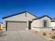 Modern single-story house with a two-car garage at 5532 E Thetis Dr, Florence, AZ 85132