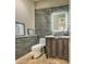 Modern powder room with sleek vanity and stone tile at 7323 E Evening Glow Dr, Scottsdale, AZ 85266