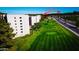 Aerial view of apartment buildings near a golf course at 7940 E Camelback Rd # 606, Scottsdale, AZ 85251