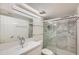 Modern bathroom with marble tile and a walk-in shower at 7940 E Camelback Rd # 606, Scottsdale, AZ 85251