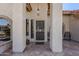 Front entrance with security door and tiled flooring at 9455 W Behrend Dr, Peoria, AZ 85382