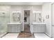 Spacious bathroom with dual vanities, a large shower, and elegant fixtures at 115 S Galaxy Dr, Chandler, AZ 85226