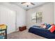 Charming bedroom with a twin-size bed and plenty of space for playtime at 115 S Galaxy Dr, Chandler, AZ 85226