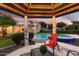 Relaxing gazebo overlooking the pool and backyard at 115 S Galaxy Dr, Chandler, AZ 85226