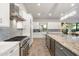 Modern kitchen with stainless steel appliances and a large island at 115 S Galaxy Dr, Chandler, AZ 85226
