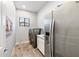 Convenient laundry room with washer, dryer, and extra storage at 115 S Galaxy Dr, Chandler, AZ 85226