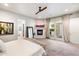 Serene main bedroom with a king-size bed, fireplace and backyard access at 115 S Galaxy Dr, Chandler, AZ 85226