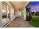 Covered patio with access to the backyard and pool at 115 S Galaxy Dr, Chandler, AZ 85226