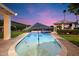 Inviting kidney-shaped pool with a spa and patio at 115 S Galaxy Dr, Chandler, AZ 85226