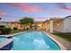 Long, inviting pool with spa and patio area at 115 S Galaxy Dr, Chandler, AZ 85226