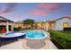 Stunning pool and spa with surrounding landscaping at 115 S Galaxy Dr, Chandler, AZ 85226