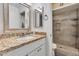 Bathroom with granite countertop, shower, and white vanity at 14410 N 42Nd Pl, Phoenix, AZ 85032