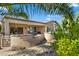 Landscaped backyard with a view of the home's exterior at 16938 W Desert Rose Ln, Surprise, AZ 85387